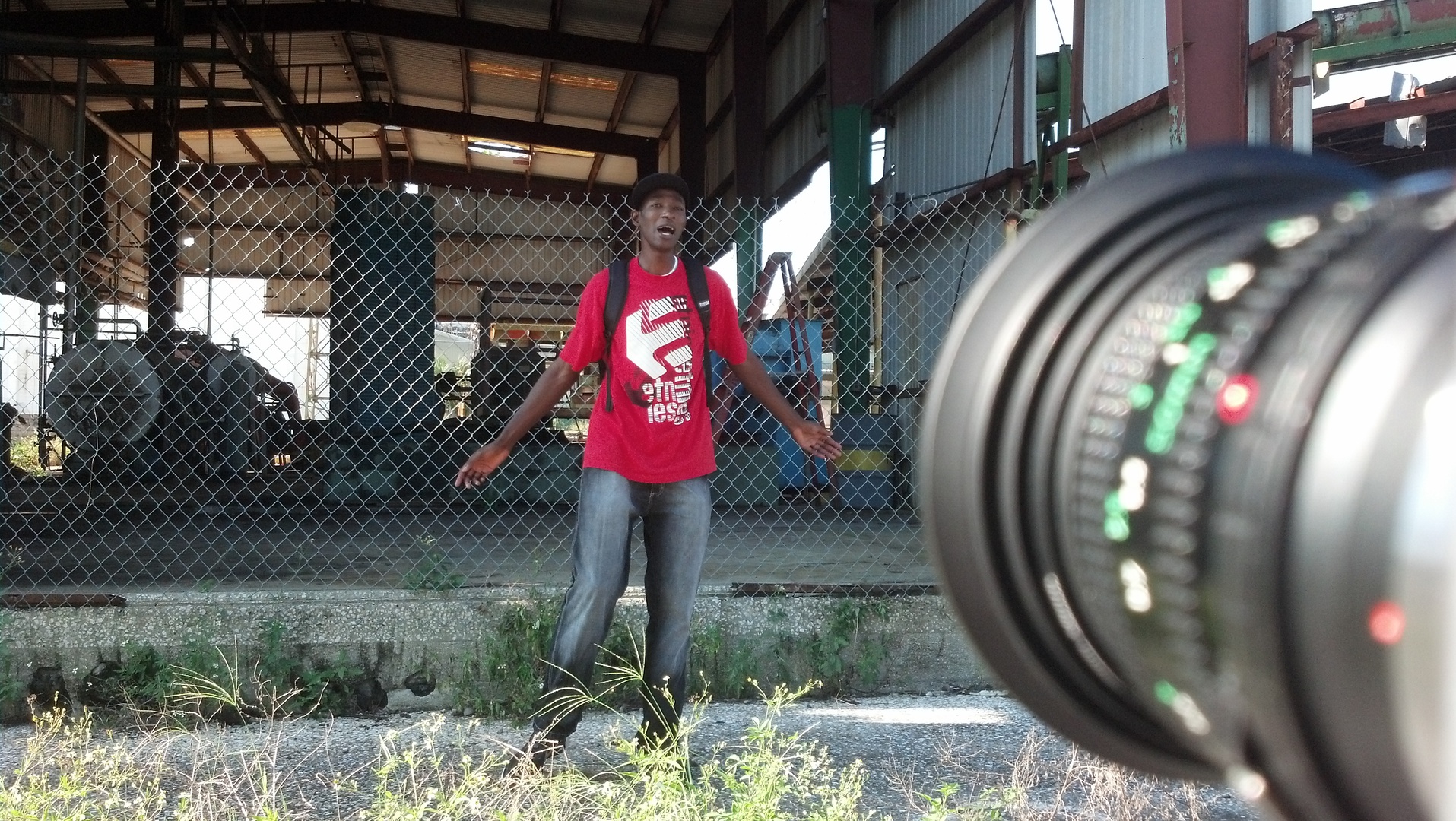 A picture of hands on rapping while filming a video